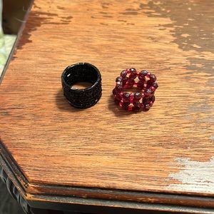 2/15 Two adjustable rings, one brown, one black